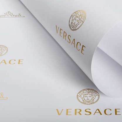 bespoke wrapping paper in white with Versace logo