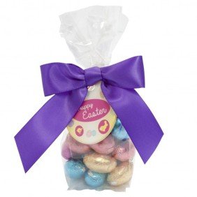 Foil wrapped chocolate eggs with printed dome tag