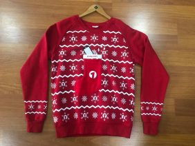Christmas jumper with stocking on chest